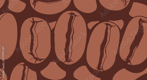 Coffee beans cover a brown surface showing their shapes and lines. The close view highlights their natural design.