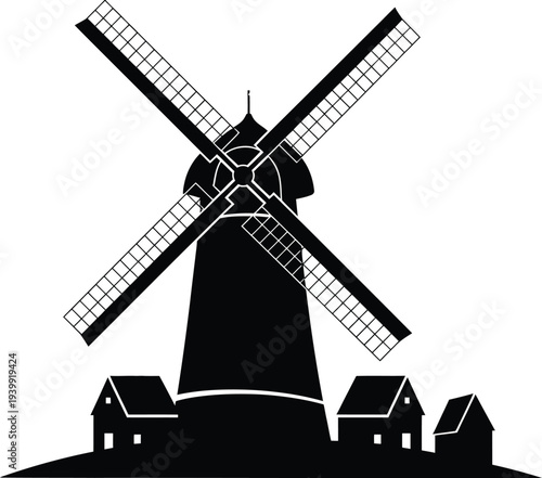 Black and white silhouette of a windmill with houses