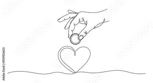 Hand Dropping Heart Shaped Object.