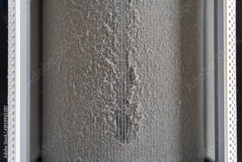 dusty air purifier filter with PM 2.5 dust many dirt and disease bacteria inside or virus and allergy to open cover and long time use dirty unclean in at home which causes allergies and sneezing