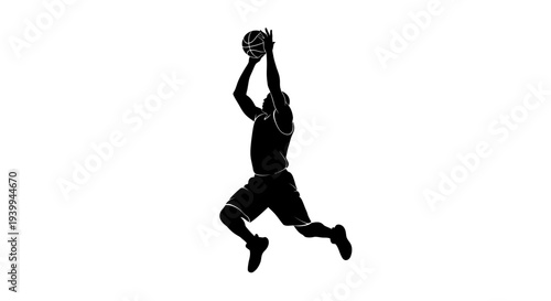Professional basketball player jumping to score with ball
