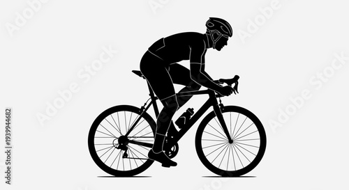 Cyclist riding bicycle in dynamic silhouette