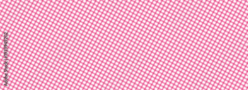 pink and white plaid fabric texture as a background.