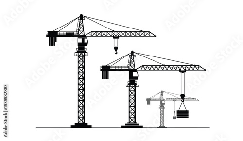 Three construction cranes of varying sizes standing in a row