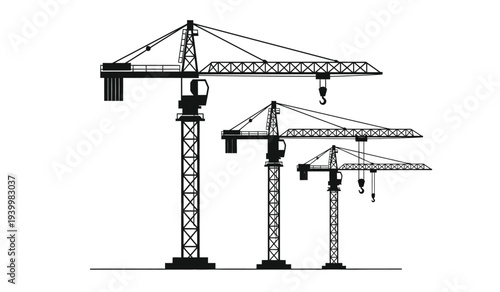 Three tower cranes of different sizes