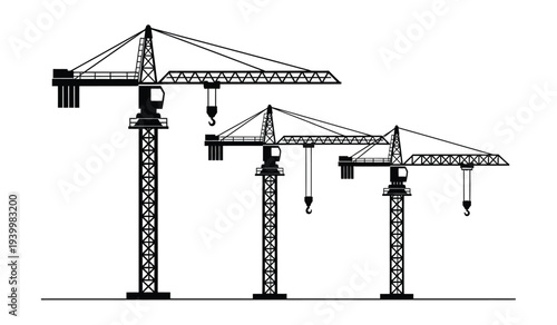 Three gantry cranes with hooks and pulleys