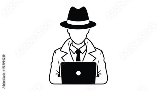 Man in suit and hat using laptop computer