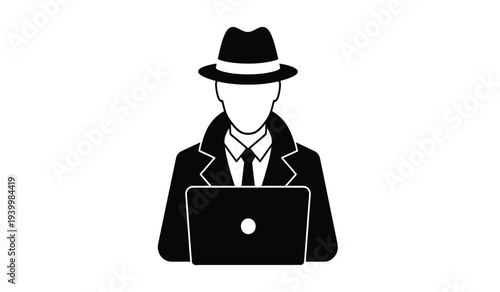 Man in a fedora hat using a laptop computer