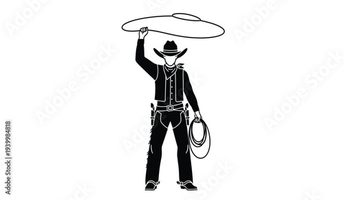 Cowboy in black outfit holding lasso rope