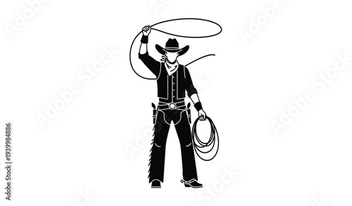 Cowboy man in black clothing holding a lasso rope standing