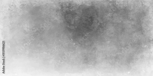 Old dark gray concrete wall with a dirty black and white grunge texture and a vintage smoke pattern for an abstract industrial background wallpaper