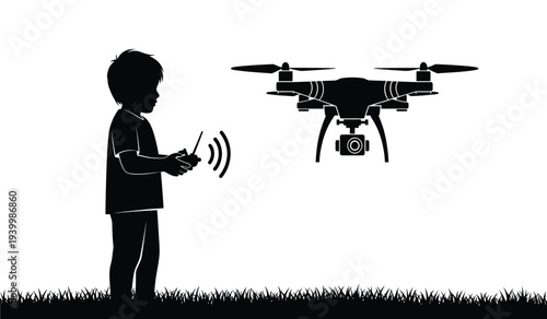 Silhouette of a child controlling a drone with a remote control on grassy terrain