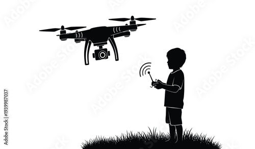 Silhouette of a boy operating a drone with a remote control in a field