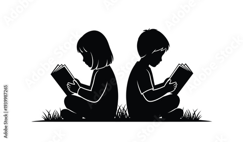 Silhouette of two children sitting on grass reading books together