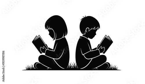 Two children sitting on grass reading books together in black silhouette