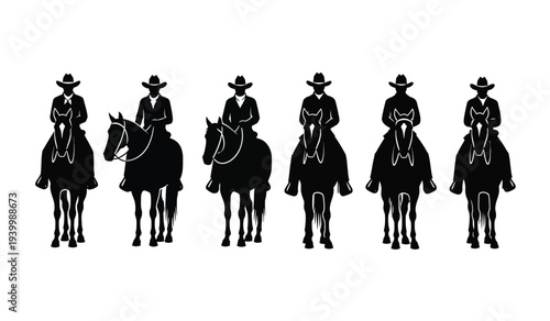 Silhouettes of cowboys riding horses
