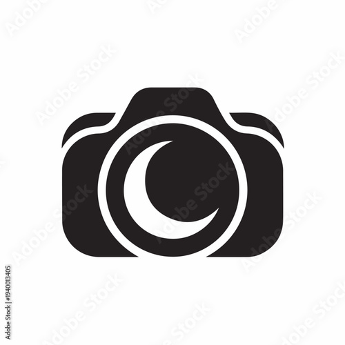  A Black and White Icon of a Camera with a Crescent Moon Shape in the Lens