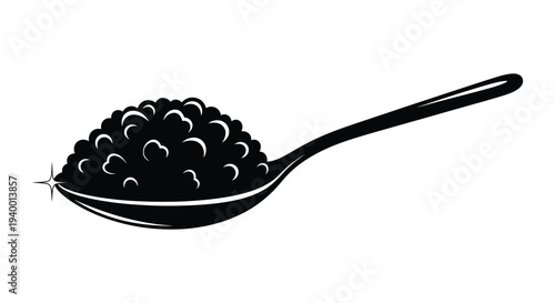 A black silhouette depicts a spoonful of granular material possibly salt or sugar with a bright sparkle silhouette