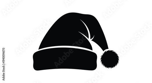 A black santa hat with a fuzzy pom pom and curved brim is displayed in stark contrast silhouette