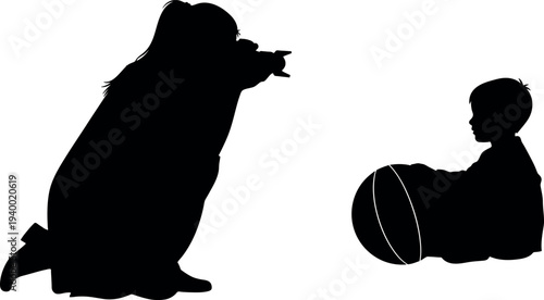 Silhouette of a dog and a man sitting on the floor