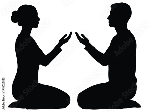 Man and woman meditating together in harmony and balance