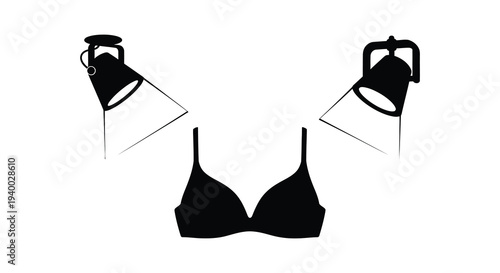 A stark composition featuring a black bra under bright spotlights creating a dramatic silhouette high quality professional detailed