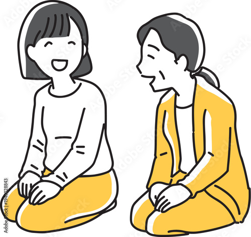 正座して話す女性2人