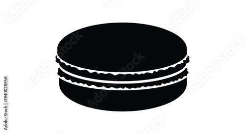 A strikingly simple black silhouette depicts a delicious macaron with layered fillings and a textured edge silhouette