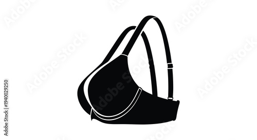A stark black silhouette of a woman s undergarment a classic bra isolated on a clean white background silhouette