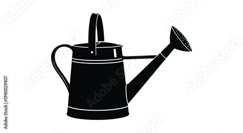 A striking black silhouette depicts a vintage metal watering can with a handle showcasing garden tool aesthetics silhouette