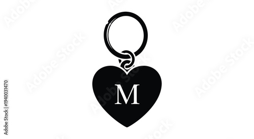 A black heart shaped keychain with the letter m displayed presented as a bold silhouette high quality professional detailed