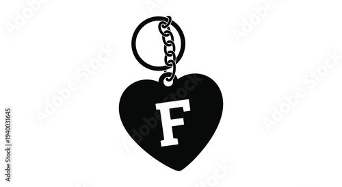 A striking black silhouette of a heart shaped keychain featuring the letter f a romantic symbol silhouette high quality