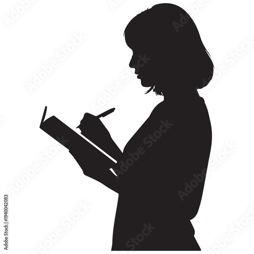 Woman writing in notebook with pen in silhouette profile