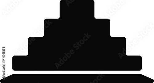 Black silhouette of a tiered pyramid or stepped structure with a flat base geometric