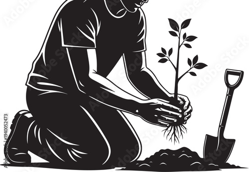 Man Planting a Small Tree in the Ground Outdoors