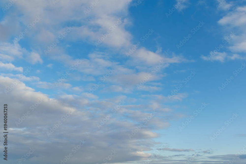 Fototapeta premium Blue Sky With Soft Scattered Clouds