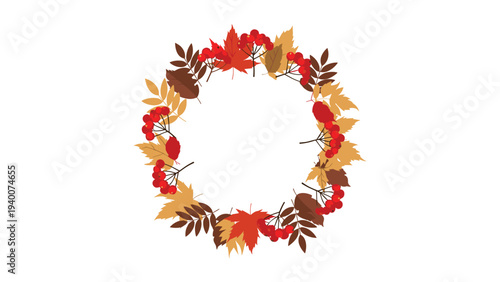 Beautiful autumn wreath composed of colorful fallen leaves and red rowan berries arranged in a circular frame on a white background.