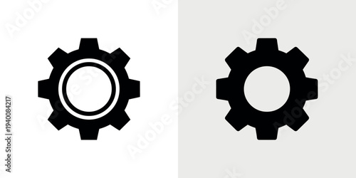 Black gear on white and gray backgrounds