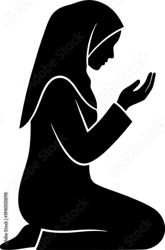 Woman in hijab praying in kneeling position