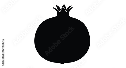 Simple black silhouette of a ripe pomegranate fruit on white background