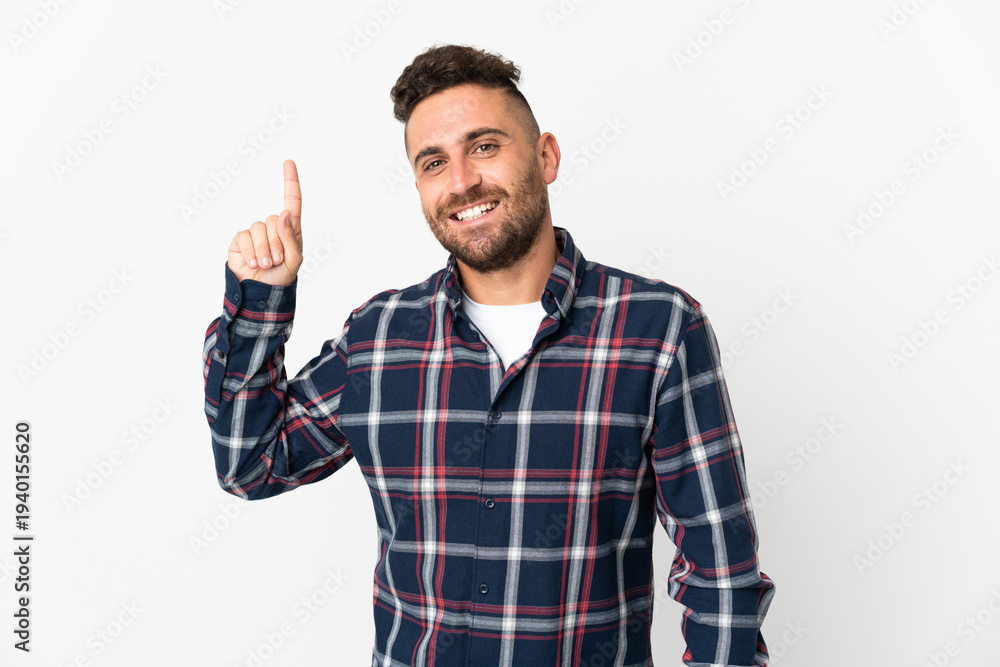 Naklejka premium Caucasian man isolated on white background pointing up a great idea