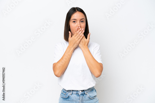 Young caucasian woman isolated on white background covering mouth with hands