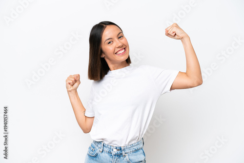Young caucasian woman isolated on white background celebrating a victory