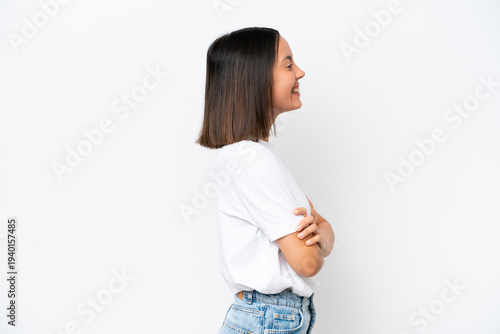 Young caucasian woman isolated on white background in lateral position