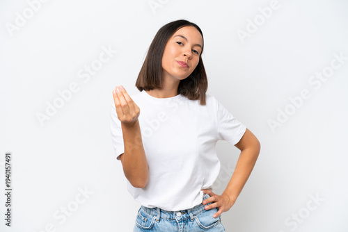 Young caucasian woman isolated on white background making Italian gesture