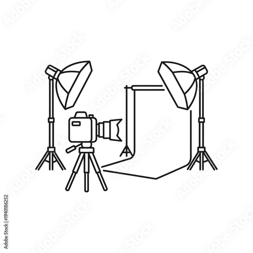 Professional Photography Studio Setup with Lighting Equipment and Camera