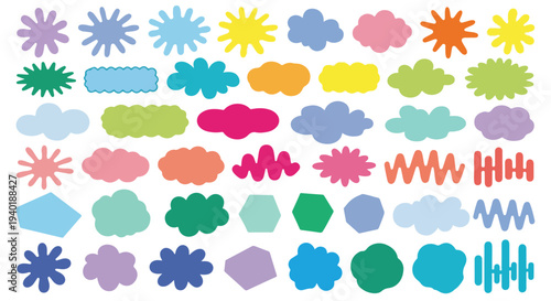 A flat lay of various colorful shapes and symbols arranged on a white background with a playful and creative mood.