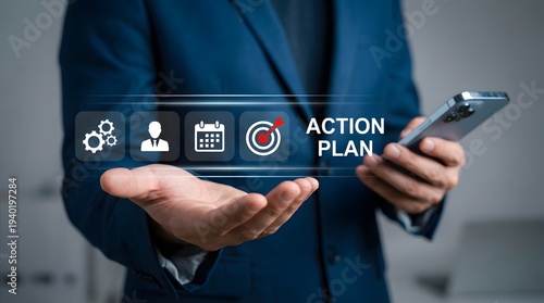 Business professional holding action plan hologram with teamwork and strategy icons in modern office environment