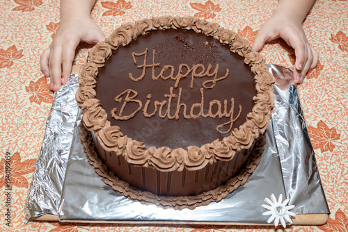 Birthday Wish – Hands Framing the Cake.