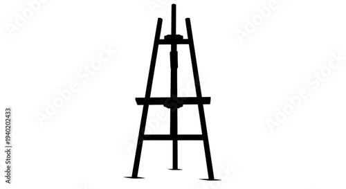 Black easel standing alone on white background for art display